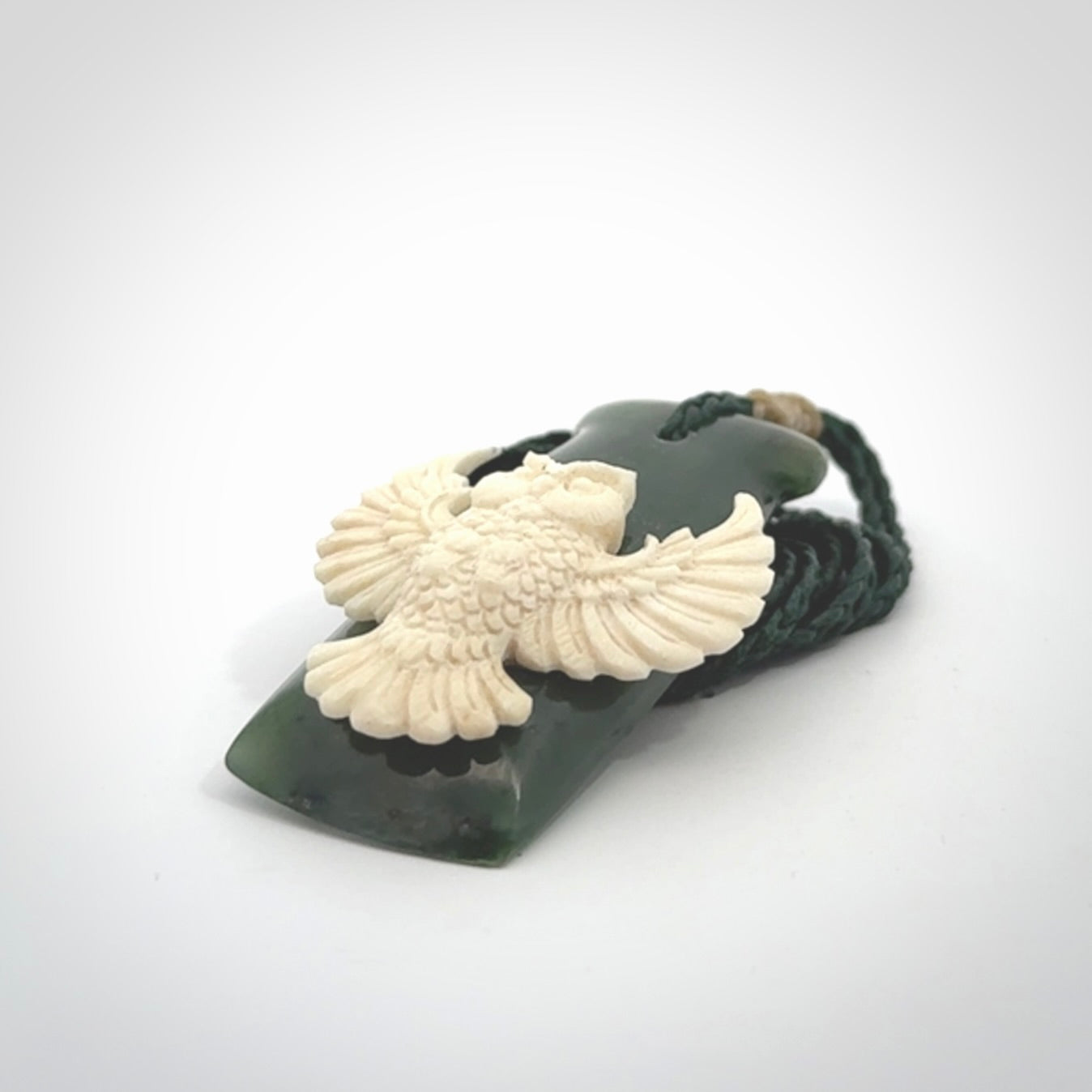 Hand carved bone owl jade toki pendant. Beautiful Jade and Bone Owl Toki pendant with adjustable cord. Delivered to you with Express Courier.