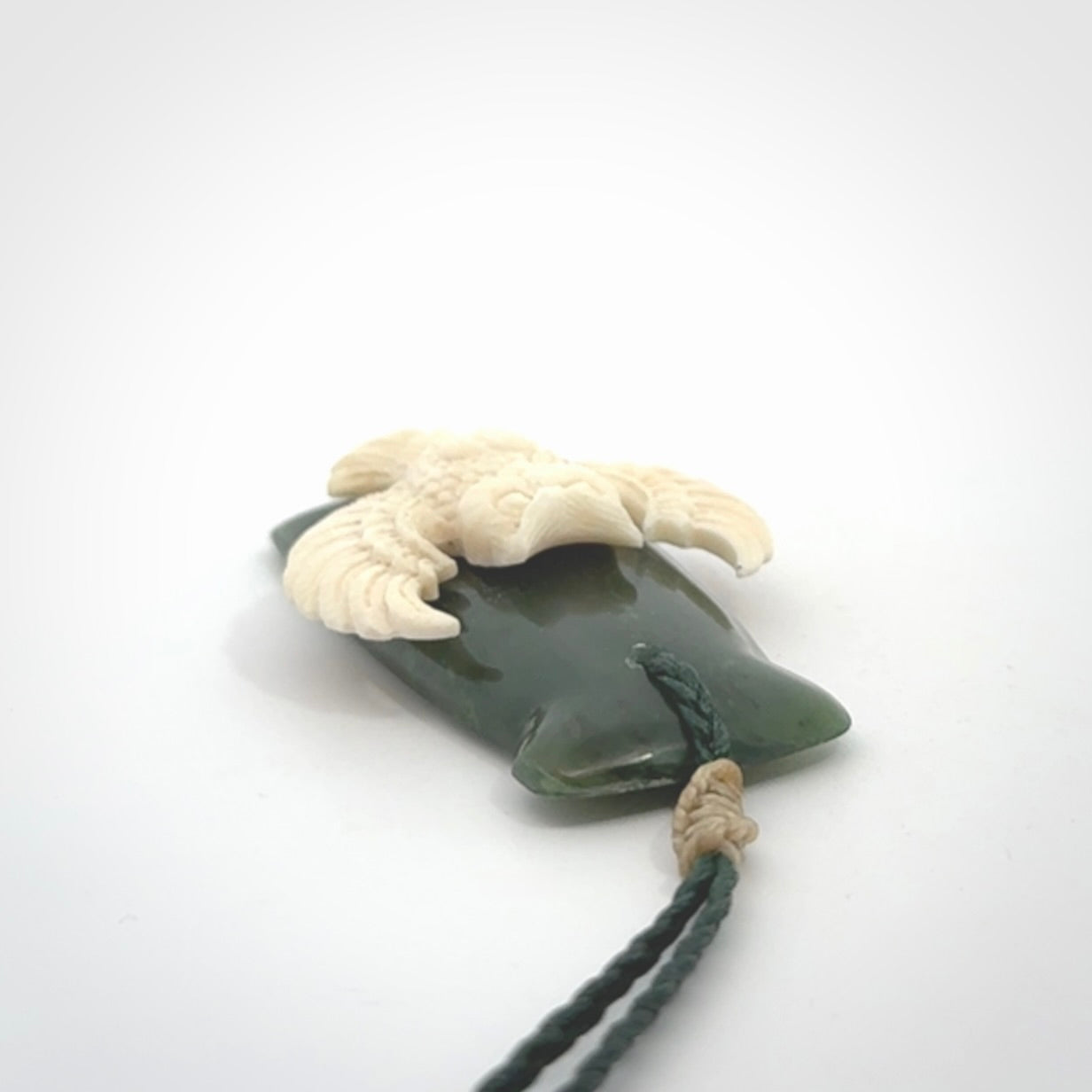 Hand carved bone owl jade toki pendant. Beautiful Jade and Bone Owl Toki pendant with adjustable cord. Delivered to you with Express Courier.