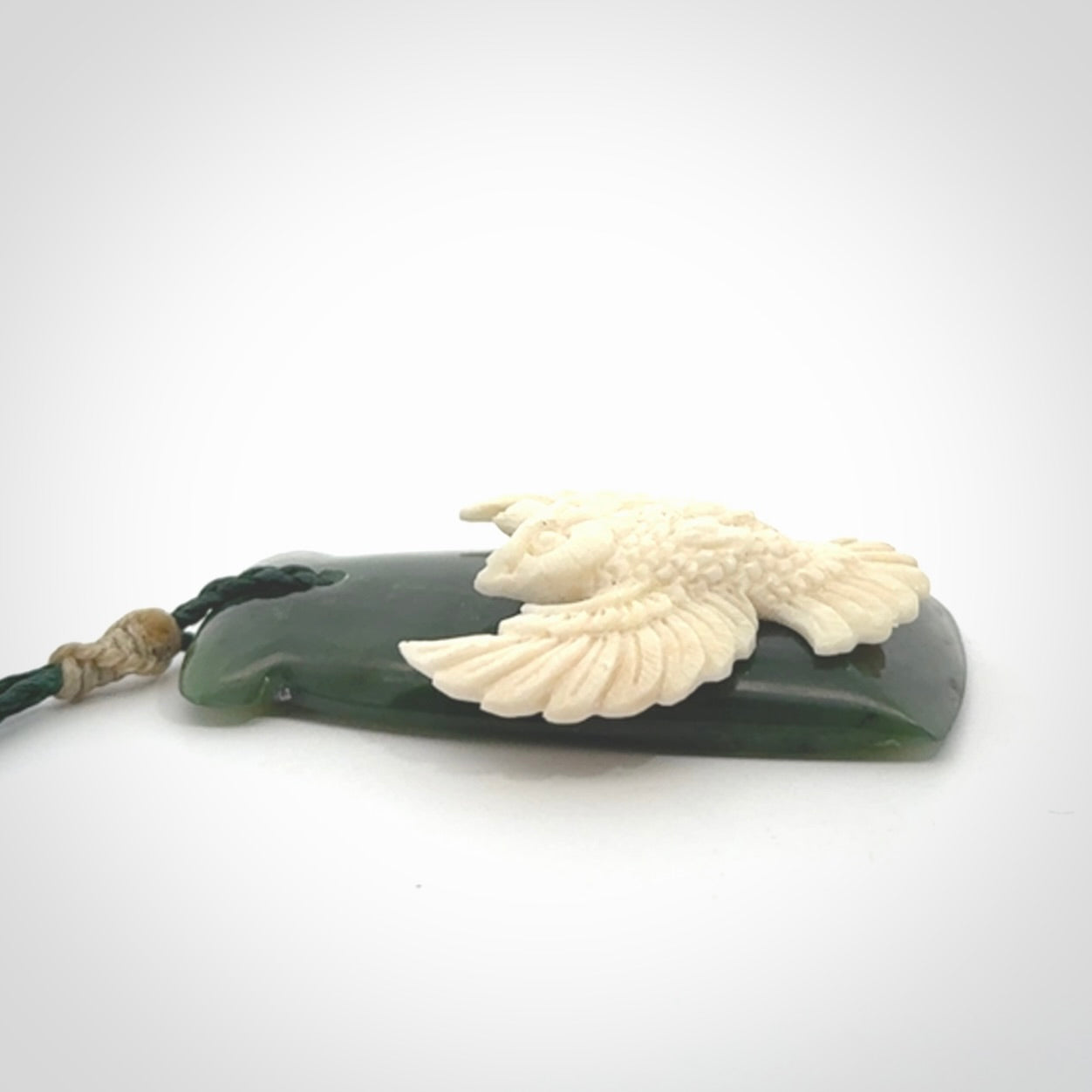 Hand carved bone owl jade toki pendant. Beautiful Jade and Bone Owl Toki pendant with adjustable cord. Delivered to you with Express Courier.