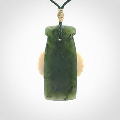 Hand carved bone owl jade toki pendant. Beautiful Jade and Bone Owl Toki pendant with adjustable cord. Delivered to you with Express Courier.