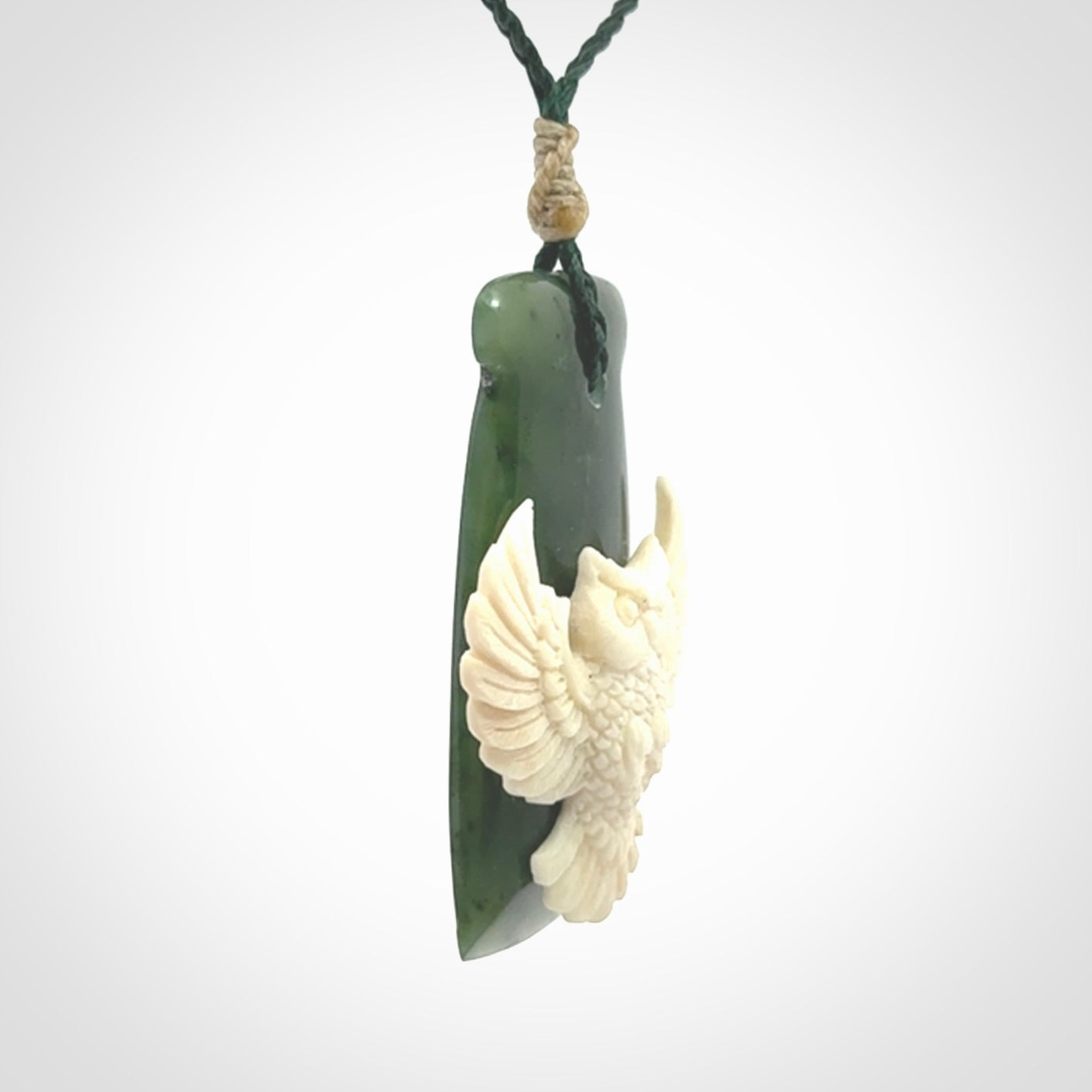 Hand carved bone owl jade toki pendant. Beautiful Jade and Bone Owl Toki pendant with adjustable cord. Delivered to you with Express Courier.