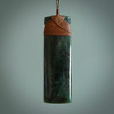 This is a lovely, one-off large, green toki pendant we've made from a gorgeous New Zealand jade. It is finished in a polished sheen and is bound with our plaited cord. These are wonderful pieces that are very attractive and will last a lifetime.
