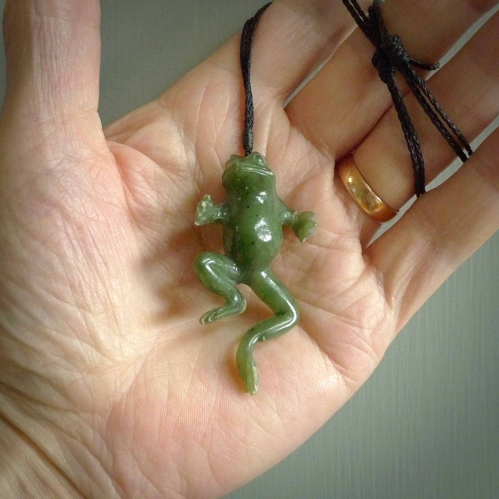 Hand carved jade frog pendant. Hand made amphibian necklace, carved from Jade