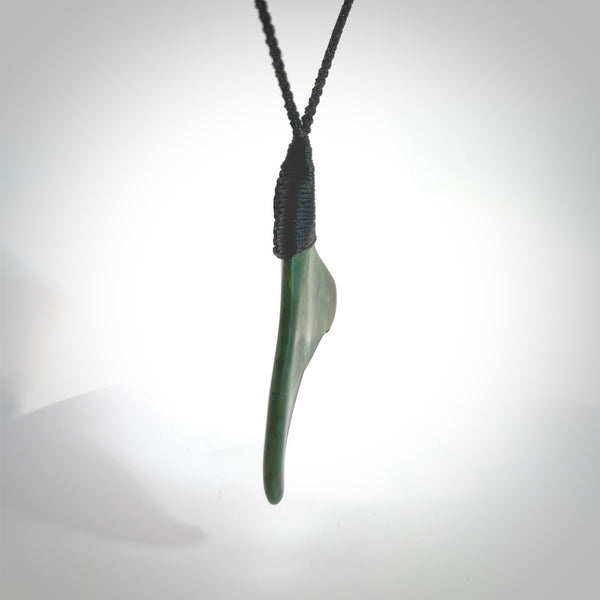 Hand carved New Zealand Jade whale tail pendant. Carved for NZ Pacific. Handmade ocean themed jewellery for sale online. Hand made by Kyohei Noguchi.