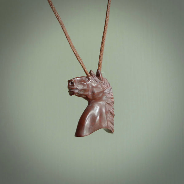 This medium sized horse pendant is made from Red Jasper Stone. We've hand carved this piece for all the horse lovers out there. Free postage worldwide. Red Jasper Stone horse head jewellery.