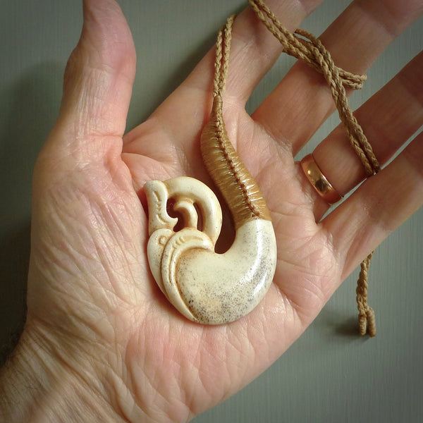 This is a wonderful pendant carved from Deer Antler. Hand made by Anthony Bray-Heta. Order yours now on NZ Pacific at www.nzpacific.com