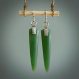 These are stunning large wing shaped drop jade earrings carved in New Zealand by Josey Coyle. It is carved from a deep green piece of New Zealand Jade and with Sterling Silver hooks and findings.