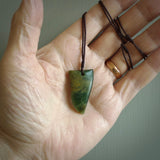 Hand carved jade niho, fang, pendant. Carved by New Zealand artist Ric Moor. Contemporary New Zealand Jade fang, drop necklace. One only unique pendant for men and women.