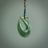 Hand carved New Zealand Jade Hook Pendant. Maori matau necklace hand carved.