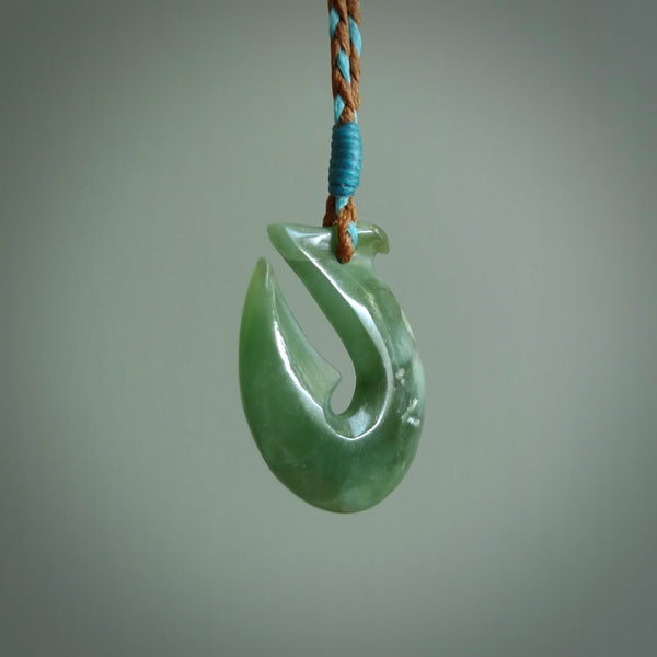 Hand carved New Zealand Jade Hook Pendant. Maori matau necklace hand carved.