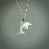 This is a gorgeous little dolphin pendant carved in jadeite. The cord is fine, hand-plaited and length adjustable so you can position the little jade dolphin where it suits you best. Shipping is free worldwide.