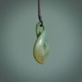 Hand carved medium sized, New Zealand jade twist pendant. Carved in New Zealand by NZ Pacific. Māori themed jewellery for sale online.