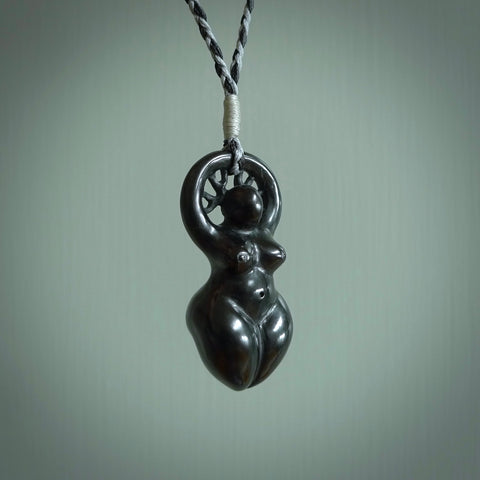 This medium sized Venus woman with tree of life head pendant is made from Red Black Jade Stone. We've hand carved this piece for all the lovers out there. Free postage worldwide. Black Jade Stone goddess, woman with tree of life jewellery.