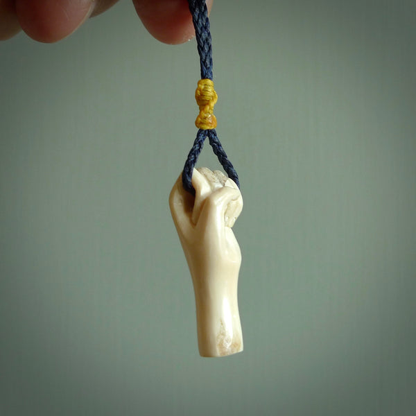 Hand carved woolly mammoth hand pendant. Carved by NZ Pacific and for sale online. Unique, handmade jewellery.