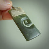 New Zealand jade toki koru pendant. Hand carved in New Zealand. Hand made jewellery.