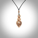 Hand carved woolly mammoth tusk twist pendant. Hand made jewellery made by NZ Pacific and for sale online. South Pacific jewellery.