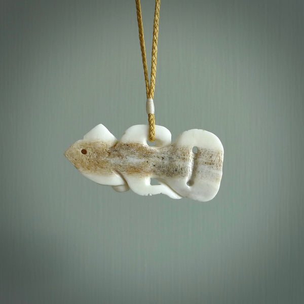 Hand carved tiki. Tiki Pendant made from deer antler by NZ Pacific. Ethnic handcarved jewellery for sale online.