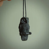 A traditional Owl design carving, hand made for us from Australian Black Jade. This is a work of art and is a collectable piece of traditional Black Jade carving. It can be worn as a special piece of jewellery or displayed. This is art made to wear at its finest. A unisex pendant for owl lovers.