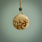 This is a hand carved elephant pendant. It is made from Tigara nut. This is a small sized necklace and is a very unique, one only, pendant that is a collectors piece. Hand carved by New Zealand artist, Sami.