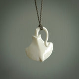 Hand carved stingray pendant. Natural bone pendants from NZ Pacific.