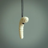 Hand carved huhu bug  pendant, carved for us by Fumio Noguchi. This piece is carved from bone and is a fantastic depiction of these bugs. This particular piece is a huhuh bug design and is lovingly carved. Free shipping worldwide.