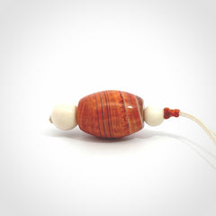 Snakeskin Agate contemporary drop pendant with woolly mammoth tusk beads. Hand carved for you by NZ Pacific.