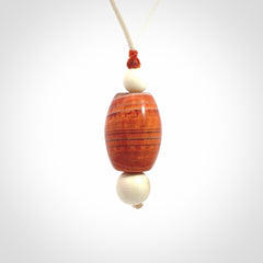 Snakeskin Agate contemporary drop pendant with woolly mammoth tusk beads. Hand carved for you by NZ Pacific.