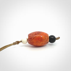 Snakeskin Agate contemporary drop pendant with black jade and woolly mammoth tusk beads. Hand carved for you by NZ Pacific.
