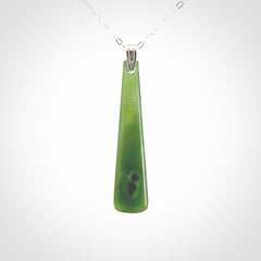 A hand carved New Zealand Jade Drop pendant with sterling silver clasp and chain.