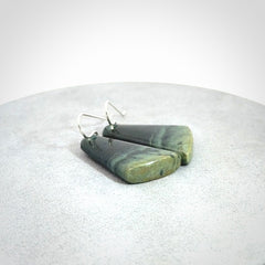 Hand crafted New Zealand Inanga Jade drop earrings with Sterling Silver Hooks. Jade drop earrings, packaged in a woven kete pouch.