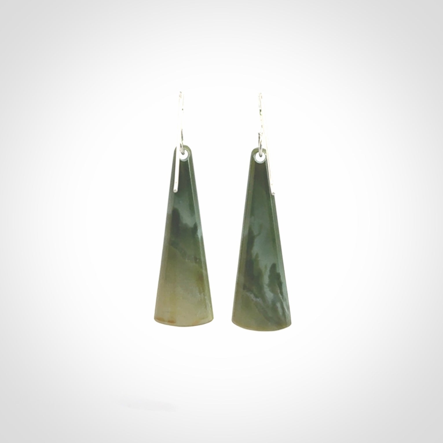 Hand crafted New Zealand Inanga Jade drop earrings with Sterling Silver Hooks. Jade drop earrings, packaged in a woven kete pouch.