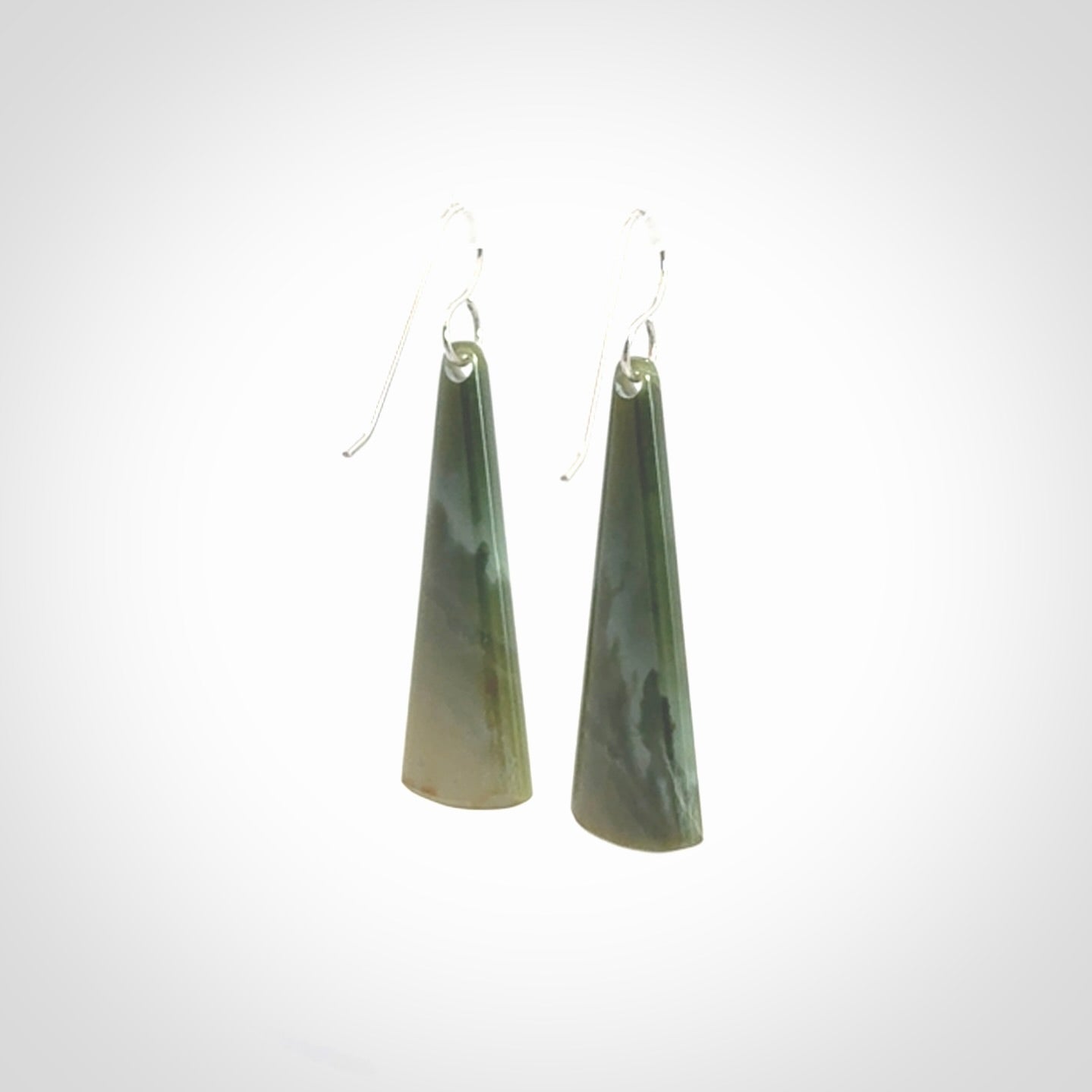 Hand crafted New Zealand Inanga Jade drop earrings with Sterling Silver Hooks. Jade drop earrings, packaged in a woven kete pouch.