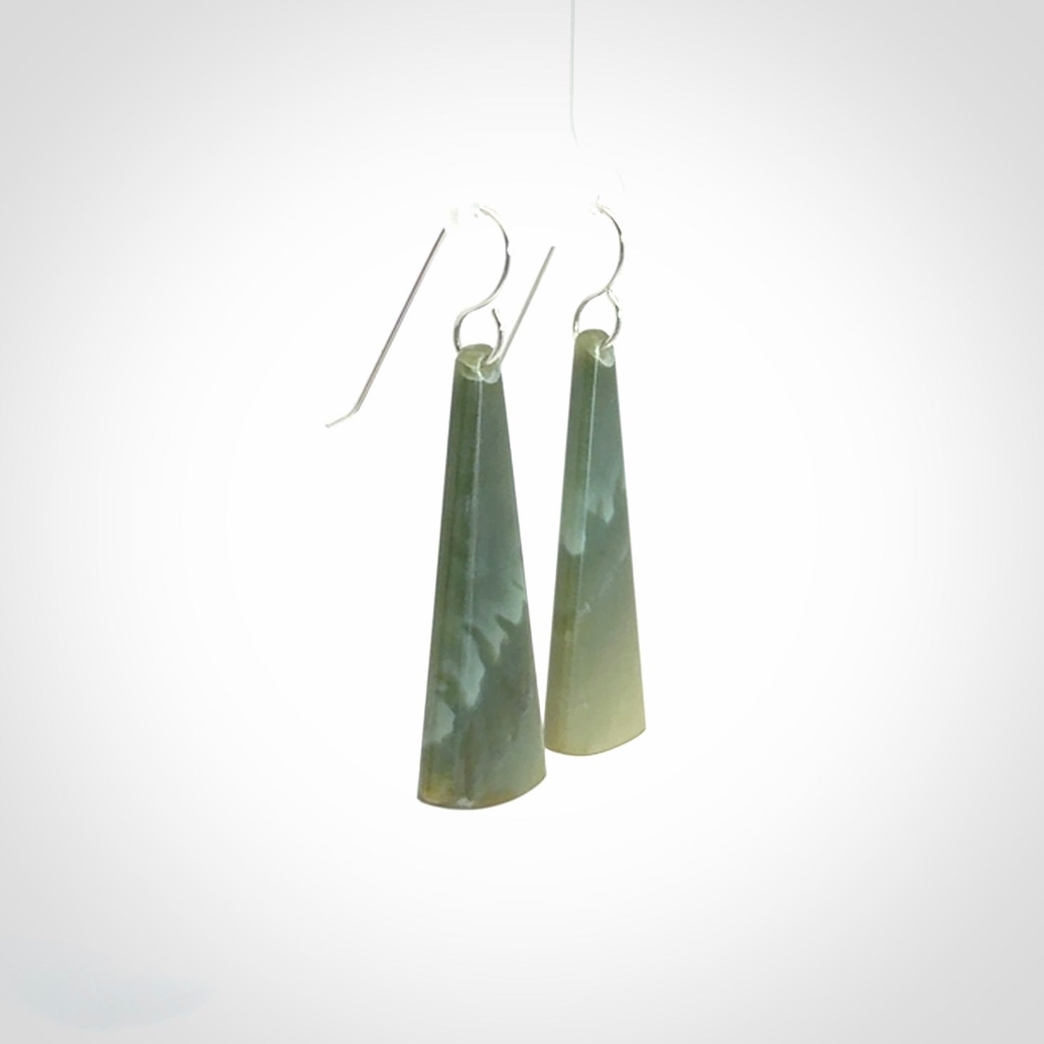 Hand crafted New Zealand Inanga Jade drop earrings with Sterling Silver Hooks. Jade drop earrings, packaged in a woven kete pouch.