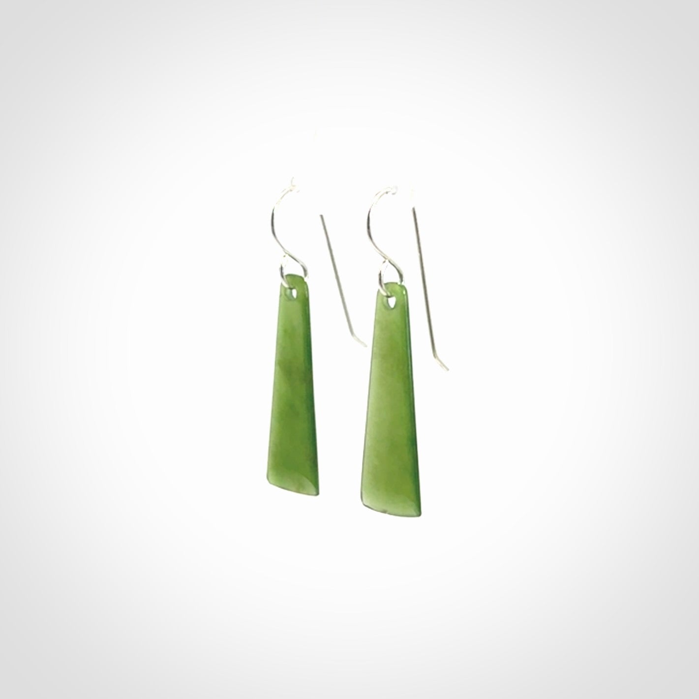 Hand crafted New Zealand Kawakawa Jade drop earrings with Sterling Silver Hooks. Jade drop earrings, packaged in a woven kete pouch.