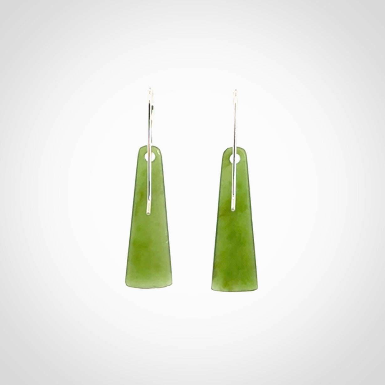 Hand crafted New Zealand Kawakawa Jade drop earrings with Sterling Silver Hooks. Jade drop earrings, packaged in a woven kete pouch.