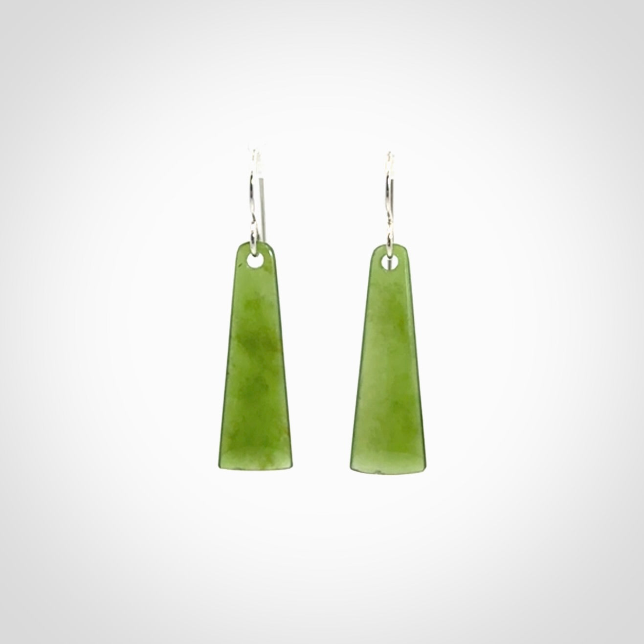 Hand crafted New Zealand Kawakawa Jade drop earrings with Sterling Silver Hooks. Jade drop earrings, packaged in a woven kete pouch.
