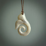 This is a wonderful, etched koru with whale tail from Deer Antler. Hand carved by Anthony Bray-Heta. Order yours now on NZ Pacific at www.nzpacific.com
