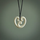 Hand carved bone pendant. Contemporary design with a traditional accent. Made in New Zealand for NZ Pacific.