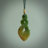 Hand carved New Zealand jade twist pendant. Carved in New Zealand by NZ Pacific. Māori themed jewellery for sale online.