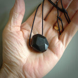 Hand carved Australian Black Jade  drop pendant. Made by Ana Krakosky for NZ Pacific in Australian black jade. A beautiful black jade necklace with black adjustable cord.