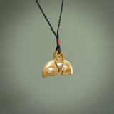 Hand carved whale tail pendant. Carved from woolly mammoth tusk in 10,000 year old mammoth tusk. A rare and original handmade pendant for ocean lovers.