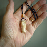 Hand carved woolly mammoth hand pendant. Carved by NZ Pacific and for sale online. Unique, handmade jewellery.