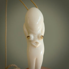 Hand carved octopus pendant in resting pose. This piece has been carved in incredible detail from bone. The artist is Fumio Noguchi, a renowned New Zealand bone carver who carves pieces for NZ Pacific. These unique bone pendants are for sale online at nzpacific.com One only collectors item for lovers of the ocean and octopus.