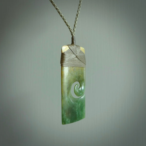 New Zealand jade toki koru pendant. Hand carved in New Zealand. Hand made jewellery.