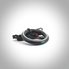 This picture shows a hand carved black jade circle pendant with sterling silver inlay. It is suspended from an adjustable Black cord. Delivery is free worldwide.