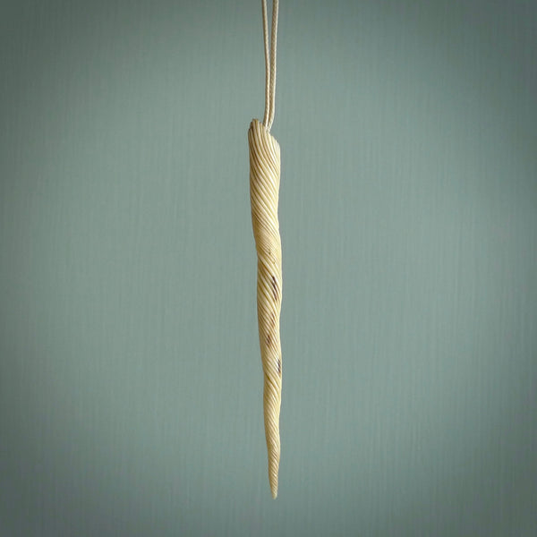 Hand carved incredible unicorn horn, woolly mammoth tusk Bone carving. A stunning work of art, beautifully replicating a unicorn horn. This pendant was hand carved in mammoth tusk by Sami. A one off collectors item that has been hand crafted to be worn or displayed.