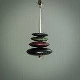 Red Jasper Stone, Black Jade and Green Jade stone stack pendant. Australian Black Jade with jasper and green stone stack pendant Handmade black jade, Jasper and green jade jewellery made by NZ Pacific and for sale online. Jasper stone stack for men and women. Unique art to wear from NZ Pacific.