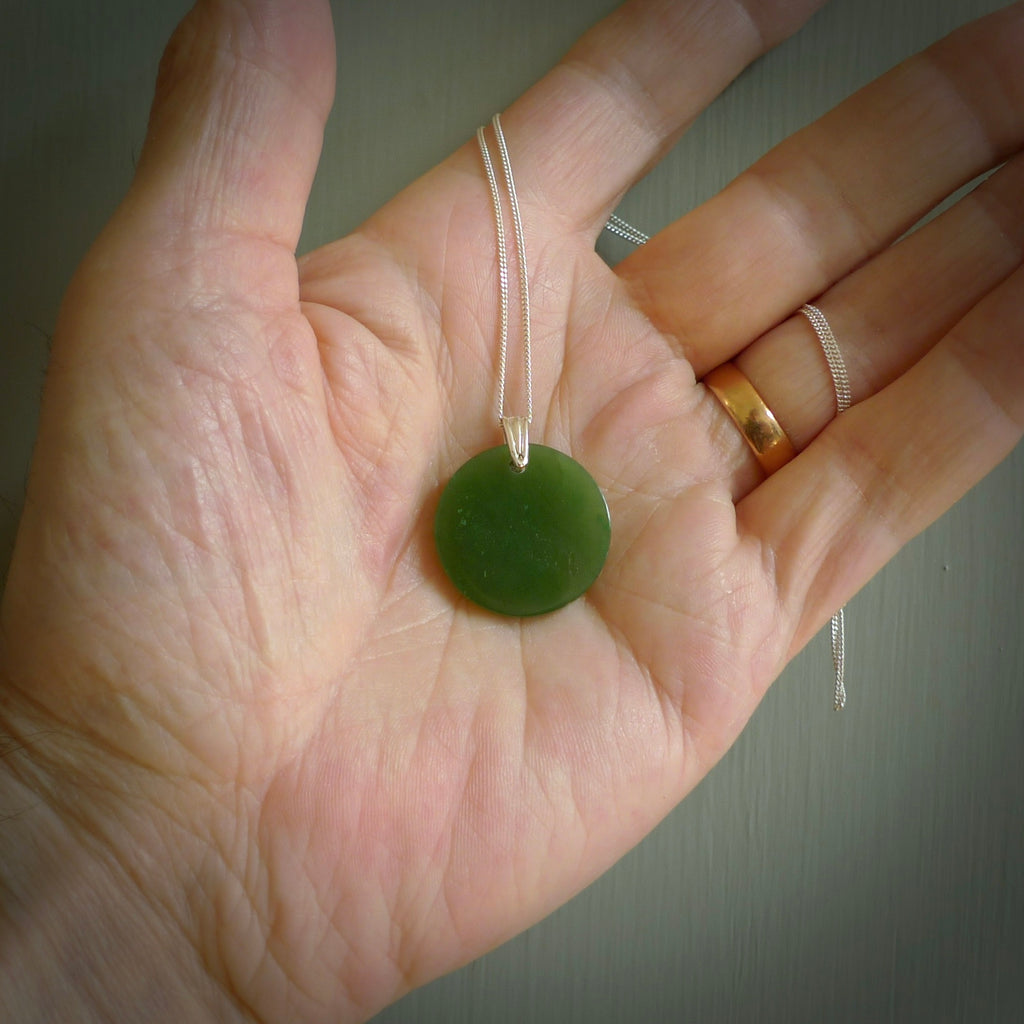 HAND CARVED BRITISH COLUMBIAN JADE DROP PENDANT. JADE DROP