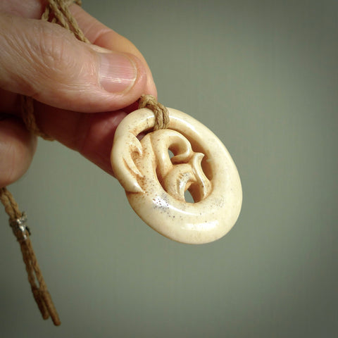 This is a wonderful manaia pendant carved from Deer Antler. Hand made by Anthony Bray-Heta. Order yours now on NZ Pacific at www.nzpacific.com