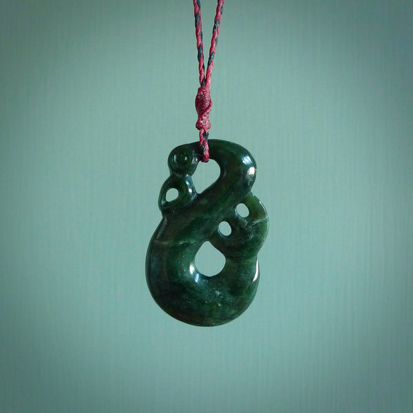 Hand carved New Zealand Jade manaia pendant. Maori pendant hand carved in New Zealand. Ethnic art jewellery. Hand made polished Manaia necklace for men and women.